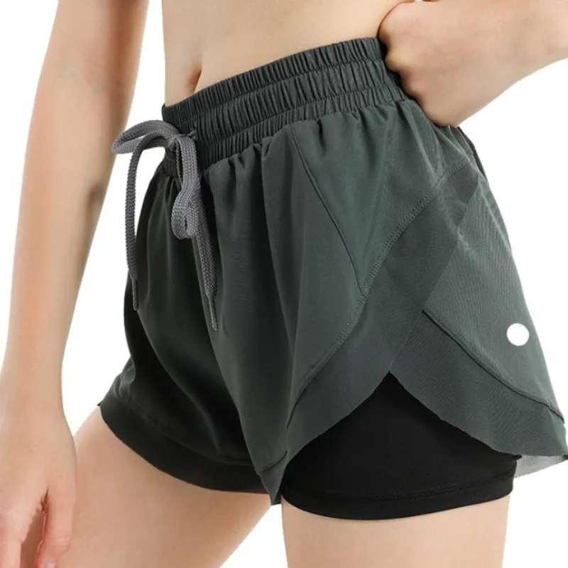 Pantaloncini da donna Pantaloncini casual da spiaggia Hotpants Fitness Yoga Pantaloncini elastici in vita larghi Tasche Pantaloni Yoga Sport Pantaloncini attivi da donna Pantaloncini da spiaggia
