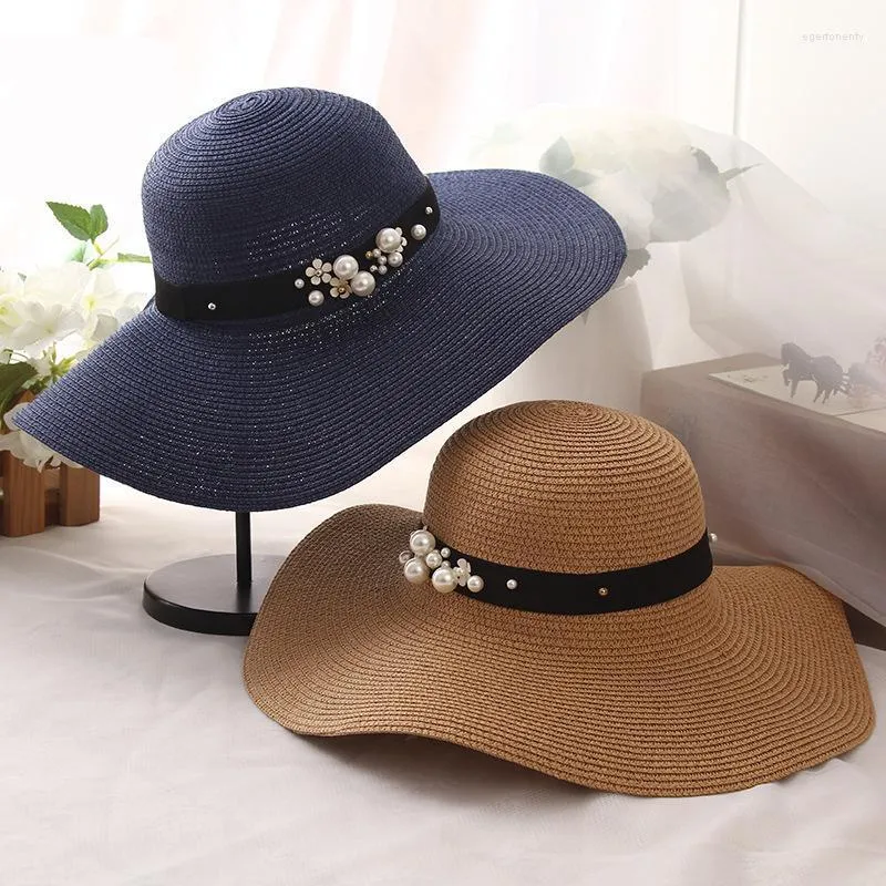 قبعات واسعة الحافة HT1163 شمس الصيف عالية الجودة للنساء الصلبة كبيرة اللون أبيض مرنة مع لؤلؤة السيدات شاطئ قبعة eger22