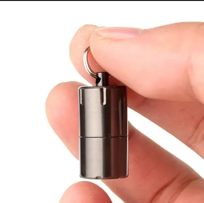 Mini gazyağı daha hafif kamp mutfak aletleri kapsül taşınabilir metal EDC dişli su geçirmez küçük fıstık çakmak anahtarlık yangın starter jasj
