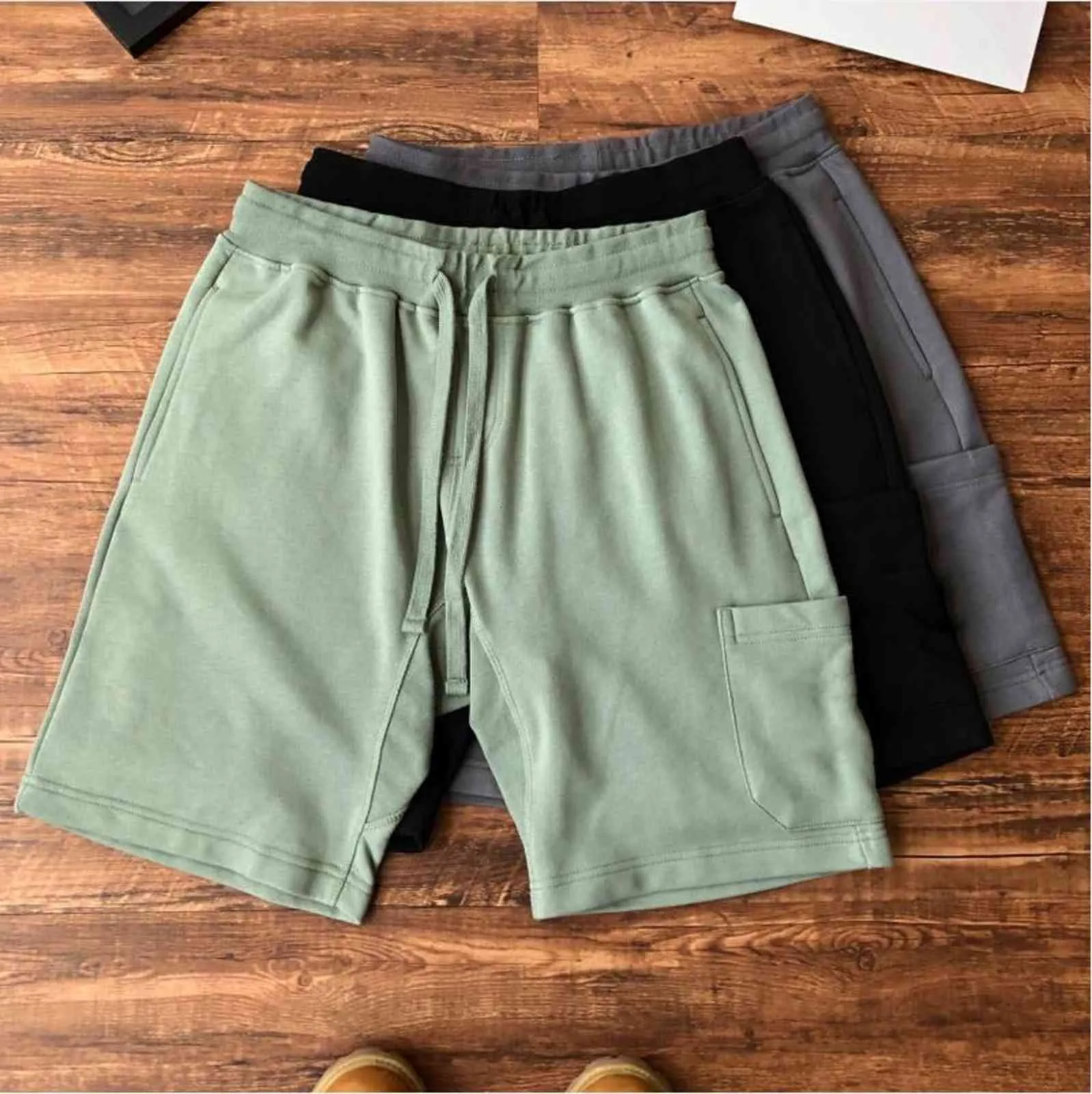 Designer Rhude Men's Shorts Loose Letter Reflective Capris Hip Hop Casual Couple mens Sports Pants Women Fashion street Brand Clothing 001