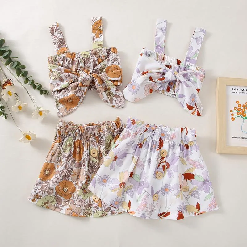 Kledingsets Baby Girl Summer Rok Pak Floral Print Mouwloze elastische bust tops knop verfraaid 2 stks kleding setsclothing