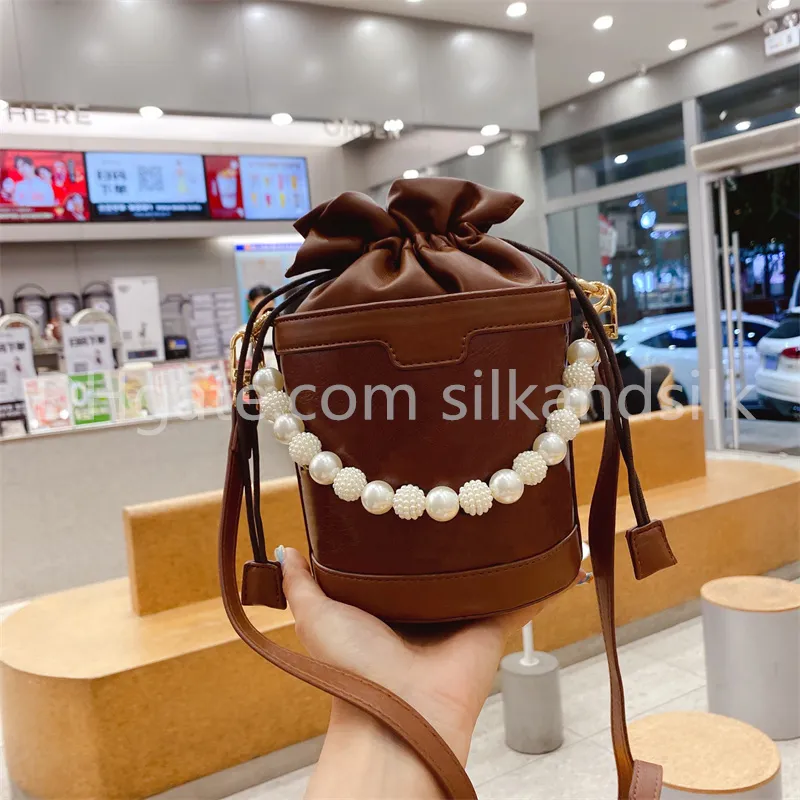 Designer hotsell barrel bag