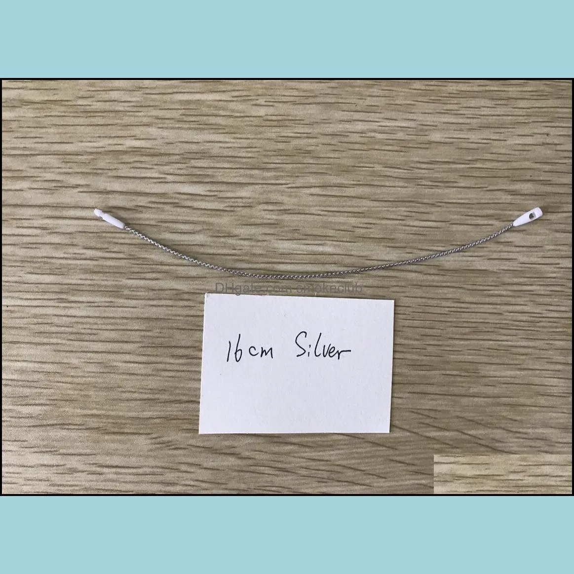 office Stock Good quality white bullet head hang tag string in apparel clothes garment price seal Plug Loop Lock Cord Fastener