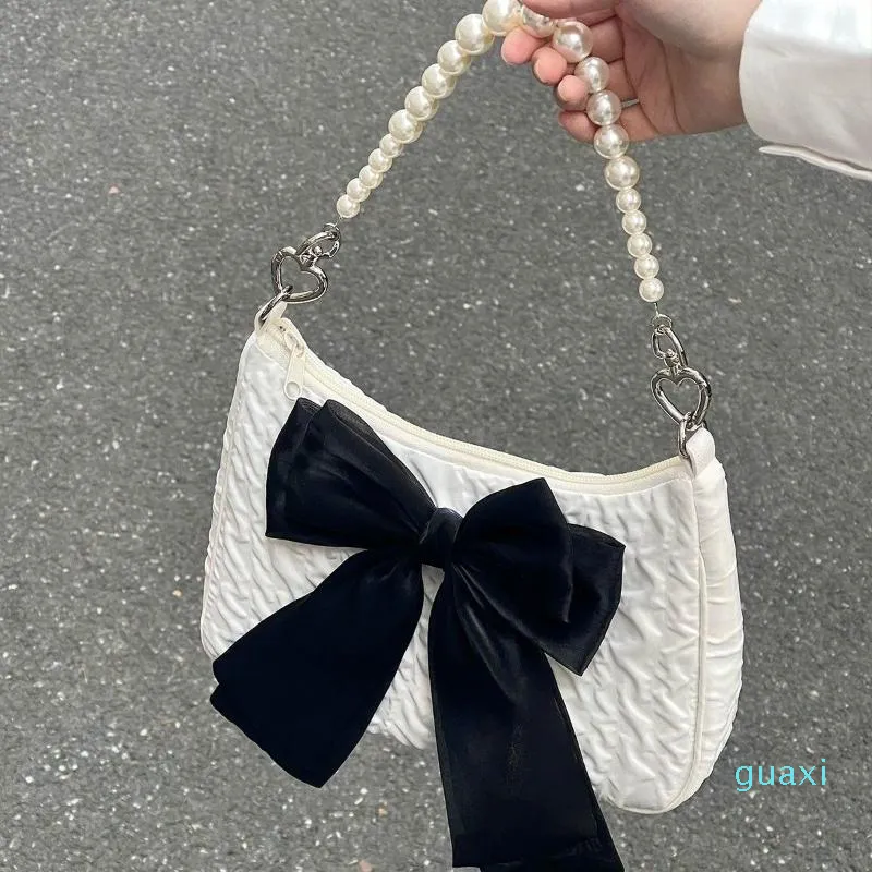 Borse da sera Sac stropicciato A Main Femme Fashion Street Stile coreano Conciso Perline Cerniera Borsa a tracolla da donna Nodo con fiocco Borse con manico superiore