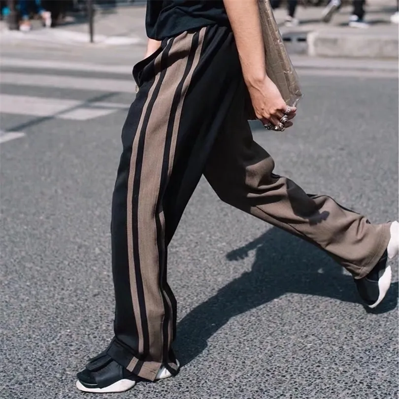 Gestreepte contrastkleur gesplitst losse casual retro broek mannen en vrouwen zijde zipper streetwear Harajuku baggy track broek T200422