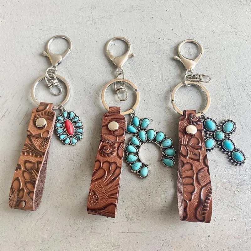 Keychains Vintage Echt lederen emboss Bloempolspolspompels Pompoen Blossoms Turquoise Cross Keychain Hoge kwaliteit Key Chain WholesalKeychai