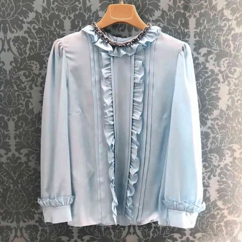 Printemps et été nouvelle chemise industrie lourde diamant clouté champignon tempérament vertical en mousseline de soie bleu haut volant