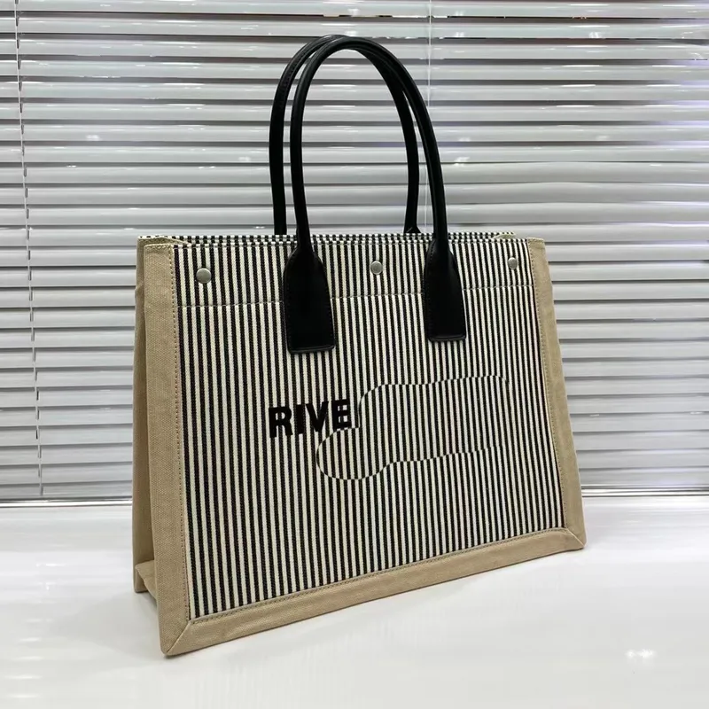 Rive Gauche Tote Shoppingväska Kvinnor Canvas Handväska Axelväskor Handtag av äkta läder Snap-stängning Modebrev Stor kapacitet Ficka Sommar Strandväskor