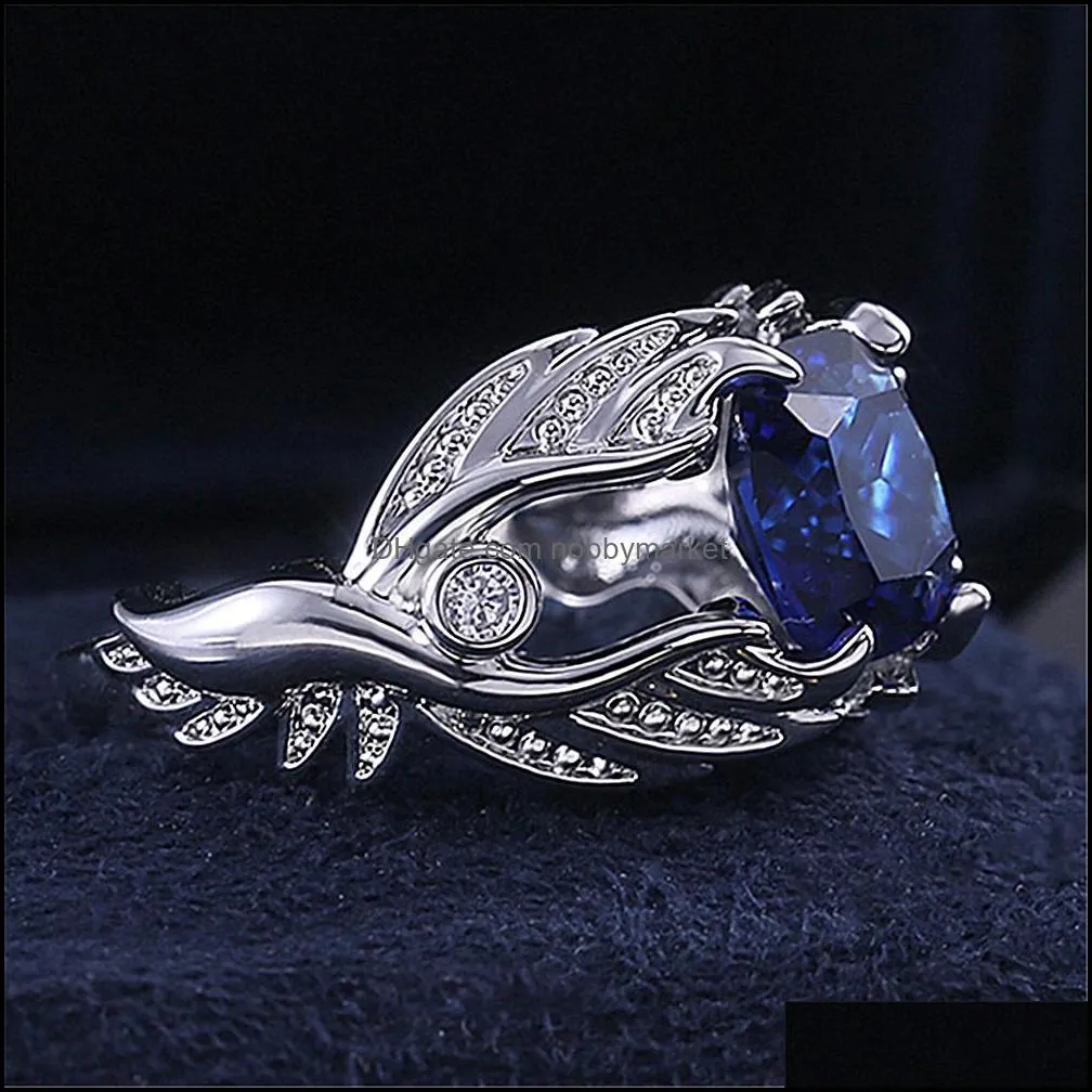 Fashion angel wings blue crystal sapphire gemstones diamonds rings for women men white gold silver color jewelry bague accessory