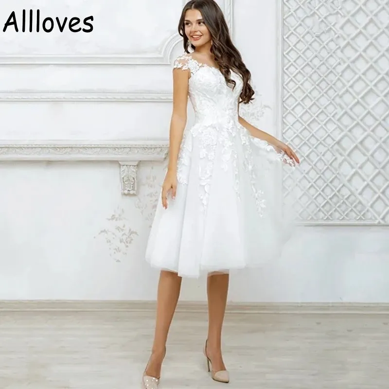 cap sleeve knee length wedding dress Fitted Cap Sleeve Wedding Gown by Adrianna Papell 40360