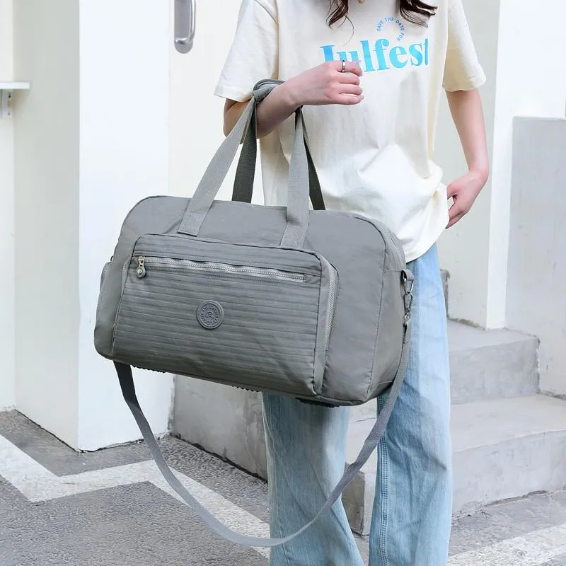屋外バッグダッフルバッグ防水ナイロン女性旅行バッグ
