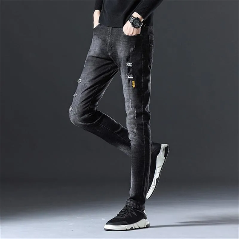 Jeans pour hommes Four Seasons pour hommes Small Feet Youth Hole Stretch Slim Brodé Pencil PantsMen's