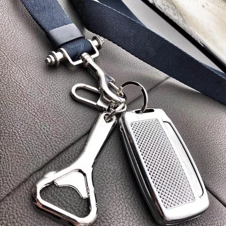 Llaves de abridor de botellas de metal individualidad llave colgante de cadena de automóviles de alta calidad parejas accesorios de regalos de joyería pequeña anillo de llave