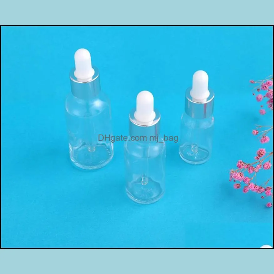 clear glass dropper bottles essential oil perfume bottles liquid reagent glass bottle with silver cap 5-100ml sn3551