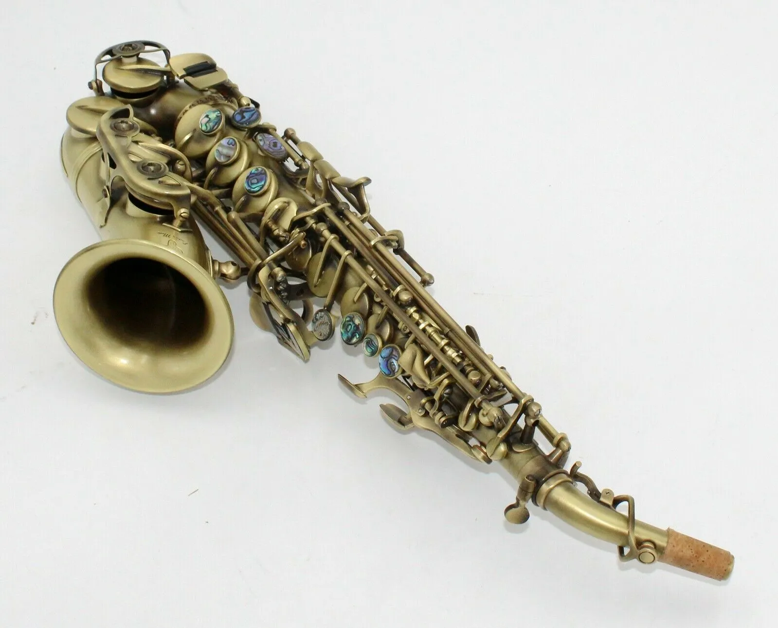 patins italiens en bronze antique installés sax saxophone soprano incurvé