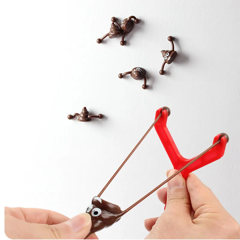 TPR Ejeção Fidget Toys Excrementos Lançador de descompressão Catapulta de brinquedo elástica para crianças Presentes