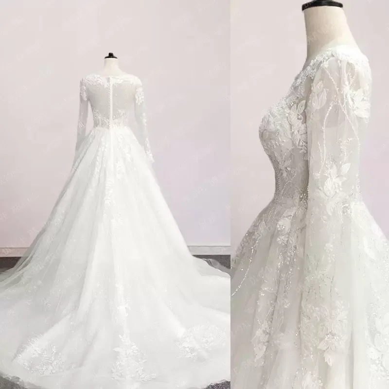 Magnifiques robes de mariée en dentelle Robe Brdail Applique Une ligne boutons couverts dos bijou cou manches longues pays sur mesure grande taille Robe De Mariee