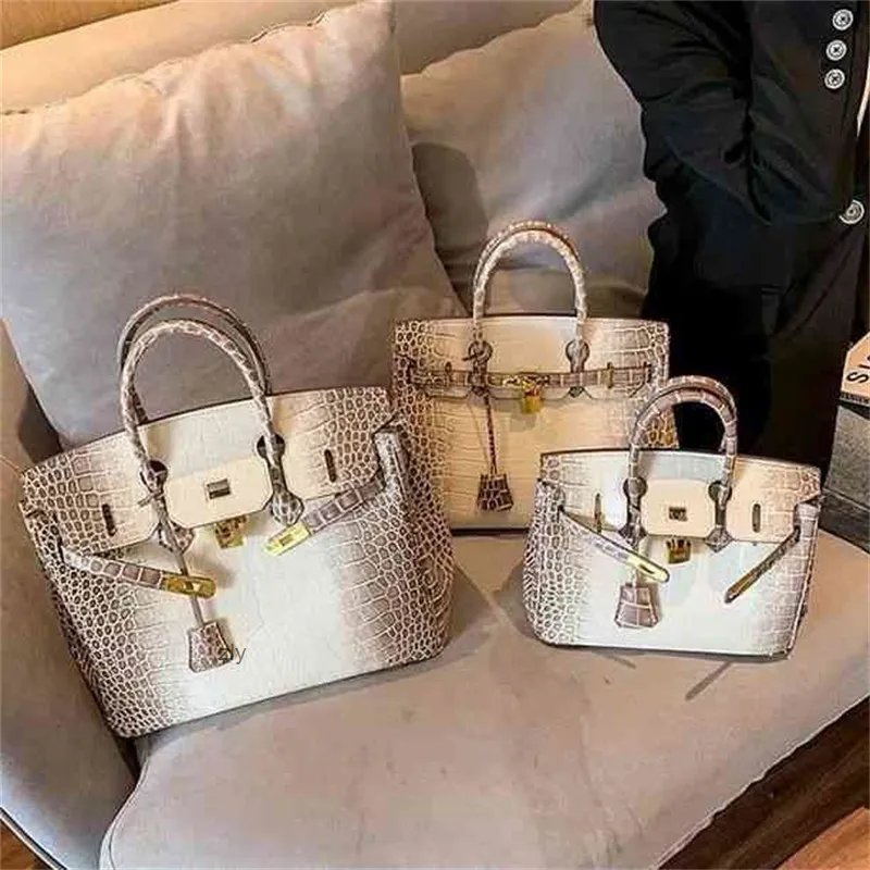 Женские сумки выдвигают Herme Birkins Platinum Bag Premium 2022 повседневная рука, кожаная пряжка