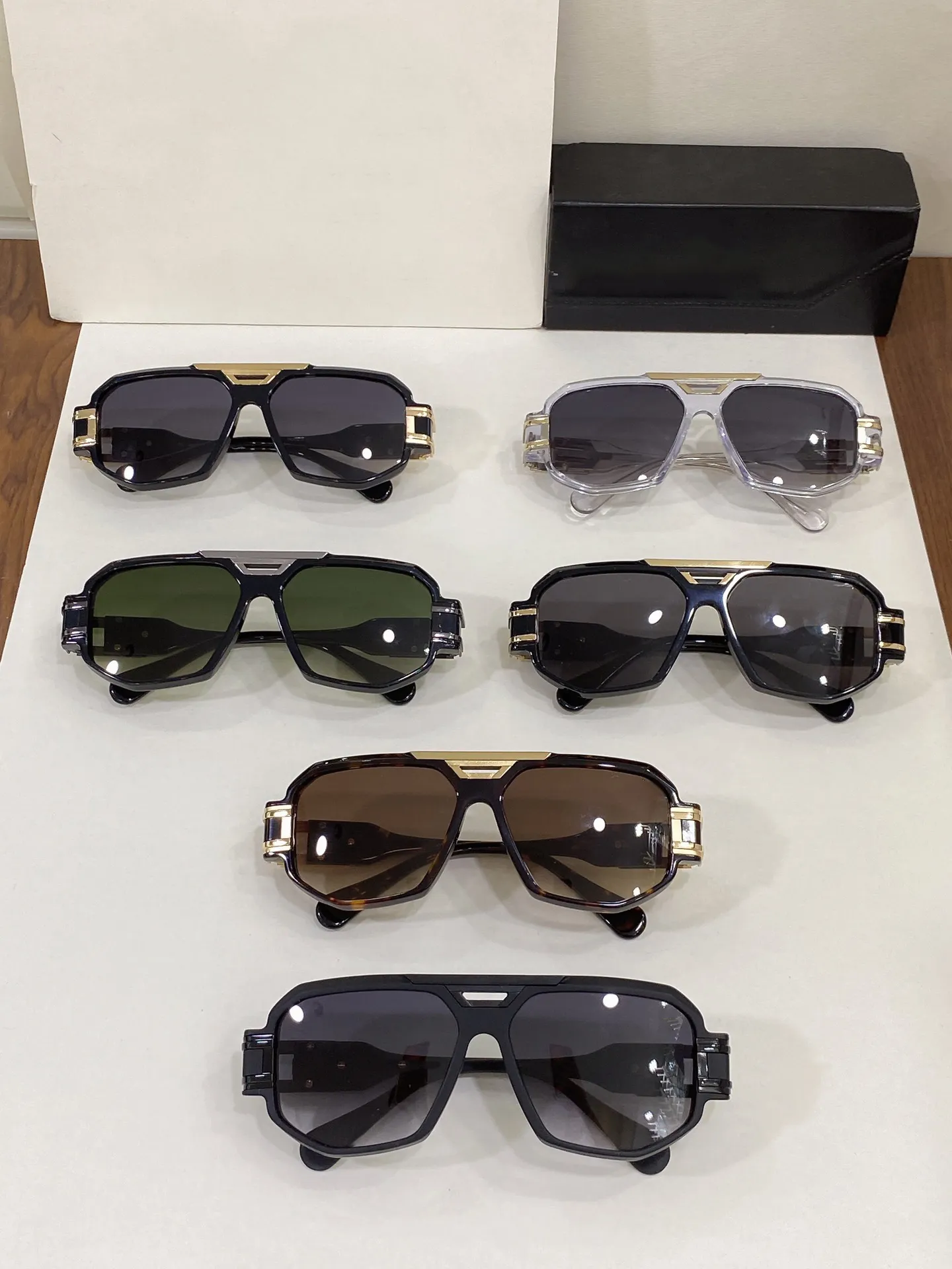 luxe designer zonnebril Men Mens zonnebril voor vrouwen vrouw brillen grote mode UV400 Bescherming Clear frame gradiënt grijze lens met kast