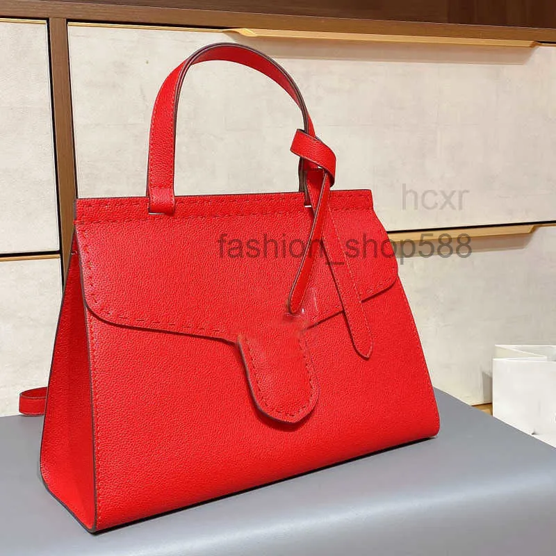 Bolsas de noite com design grande Bolsa de ombro de couro real de alta qualidade Moda Bolsa de mão Bolsa de corpo cruzado Bolsa de corpo cruzado Simples Clutch Hardware Hasp 2022 de alta qualidade