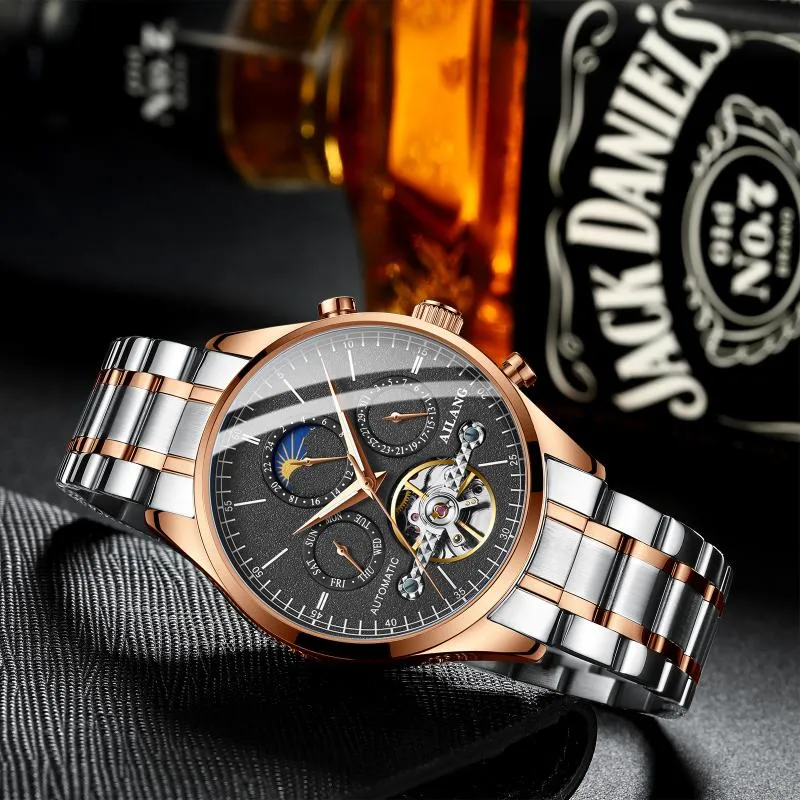 Montres-bracelets en gros montre pour hommes Tourbillon évider automatique mécanique bande d'acier affaires montre transparente montres-bracelets