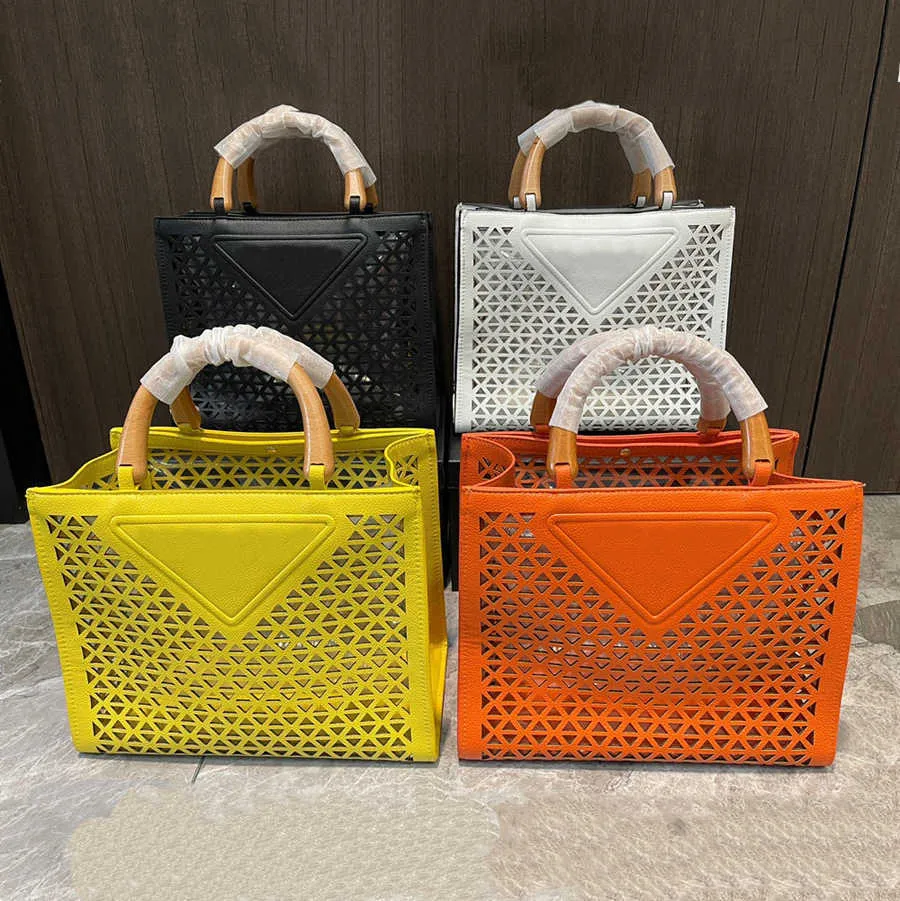 2022 Top-quality Beach Bags Classic Leather Designer Handbags for Ladies Armpit Shoulder Bag Baguette Multi-Color Fashion wholesale Hollow out the tote