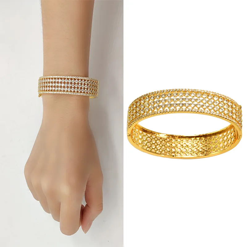 three-strand adjustable textured Milano bangle bracelet features 3 stations  with simulated diamonds two-tone open cuff pave bangle bracelet is set in  bonded with platinum and gold-plated sterling silver - Diamond & Design
