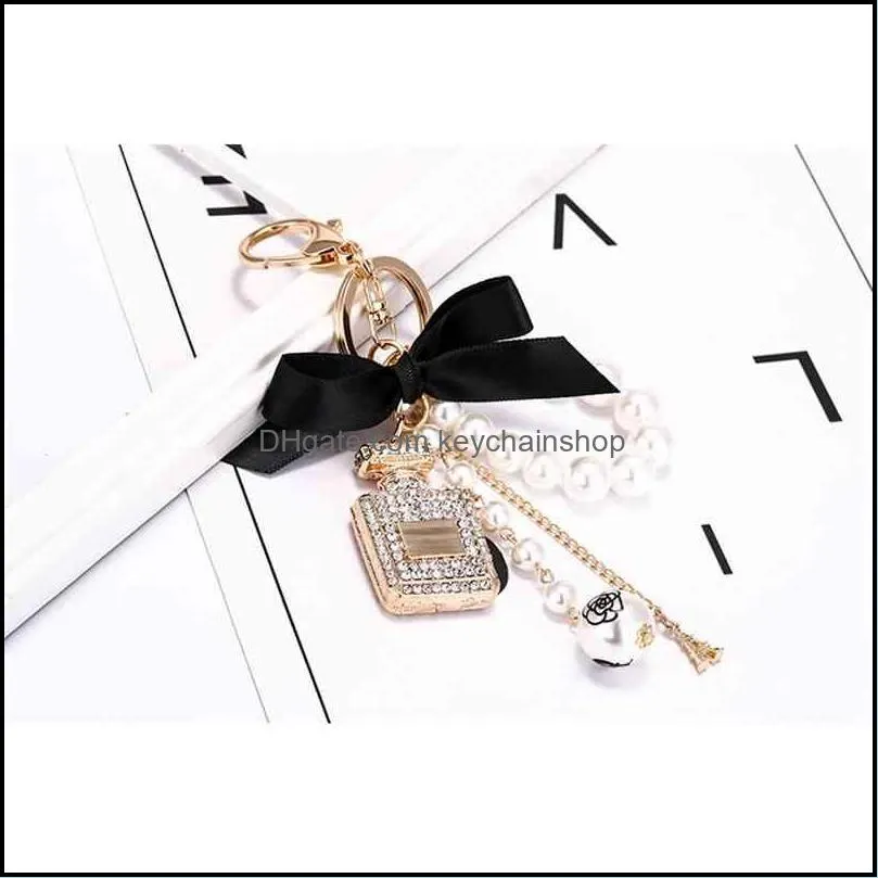 creative handmade diy diamond perfume bottle accessories alloy bow pearl luxury keychain purses charm pendant ys068