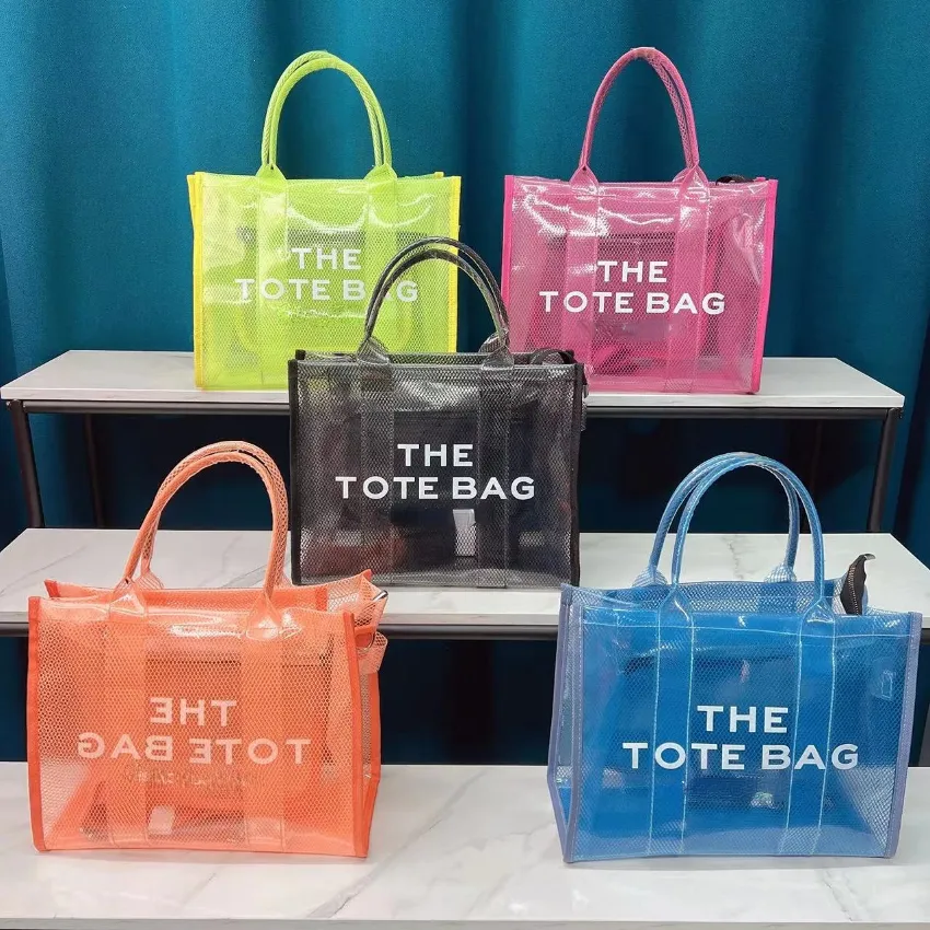 Sacs fourre-tout transparents d'été pour femmes de créateurs de mode 2022 Nouveaux sacs à main de grande capacité de couleur gelée en PVC avec bandoulière Be295H
