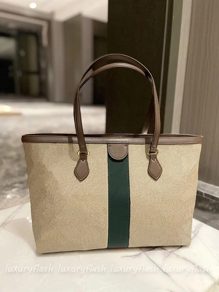 Canvas handbags with leather trim on sale