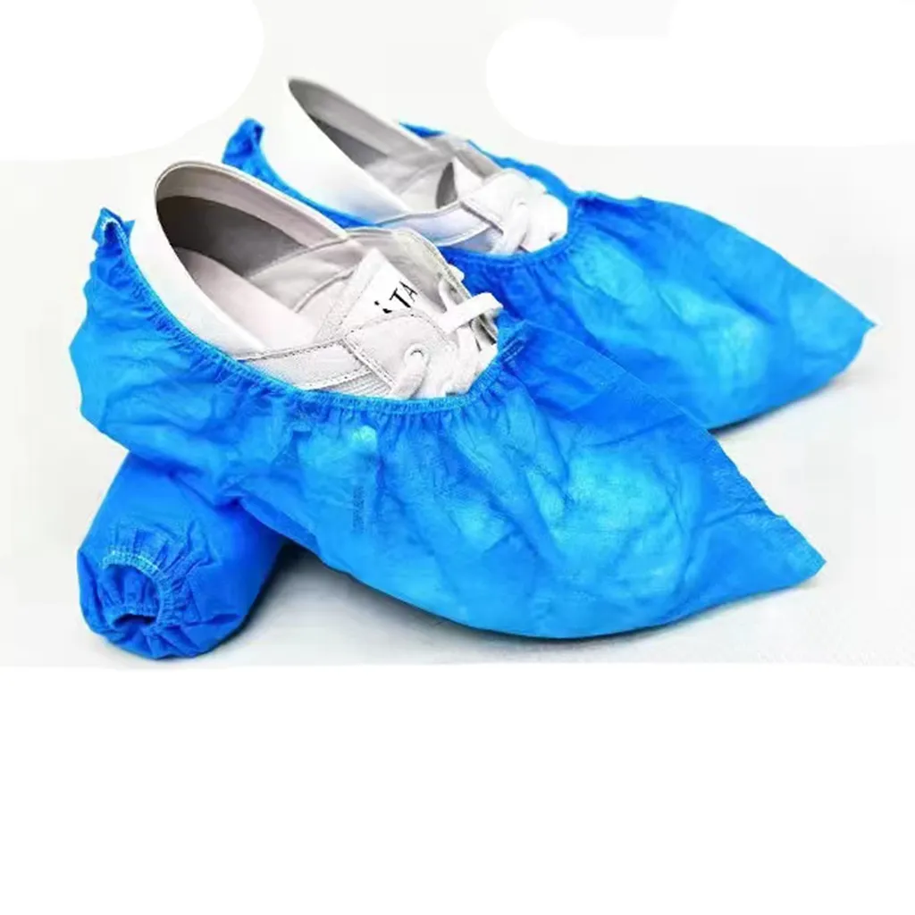 100 piezas/cubiertas de lotes cubiertas de botas de zapatos desechables botas de tela no tejidas para el olor a prueba de olor a prueba de olor a prueba de zapatos mojados