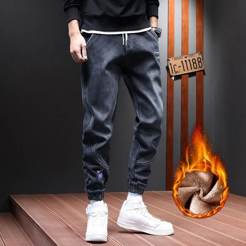 Jeans da uomo addensati pantaloni Harem elasticizzati autunno/inverno plus cashmere