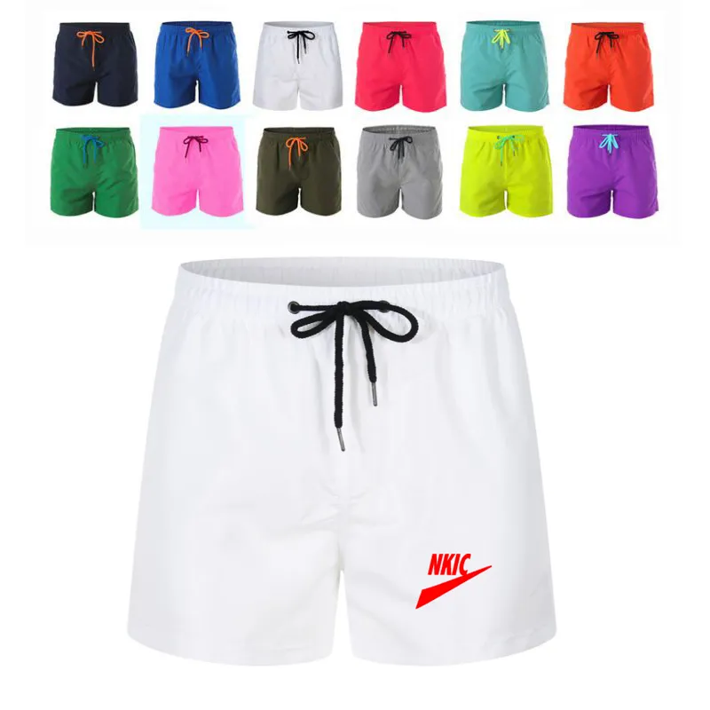 Mode Män Fitness Bodybuilding Märke Vita shorts Man Sommar Gym Träning Man Andas Snabbtorka Sportkläder Jogger Beach Shorts