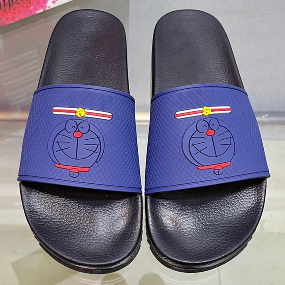 Sandálias de sandálias de designer de luxo New Mens com logotipo e padrão de desenho animado para destacar a personalidade da marca Classic Fashion Swimming Poach Beach Slipper