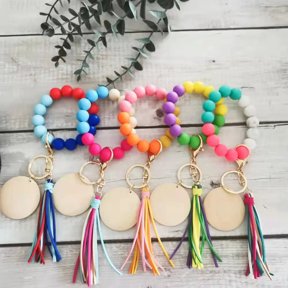 Utrikeshandel Matkvalitet Silikonpärlor Multi-Style Wrist Keychain Partihandel Koreansk Velvet Handgjord läder Tassel Blank Disc Keychain Kvinna Multicolor Valfritt