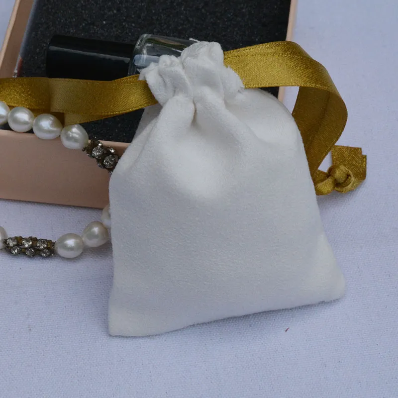 Custom White Suede Gift Bags Gold Ribbon 7x9cm 8x10cm 9x12cm 10x15cm 13x17cm pack 50 Party Candy Sack Cosmetic Jewelry Logo Flannel Packaging Pouches