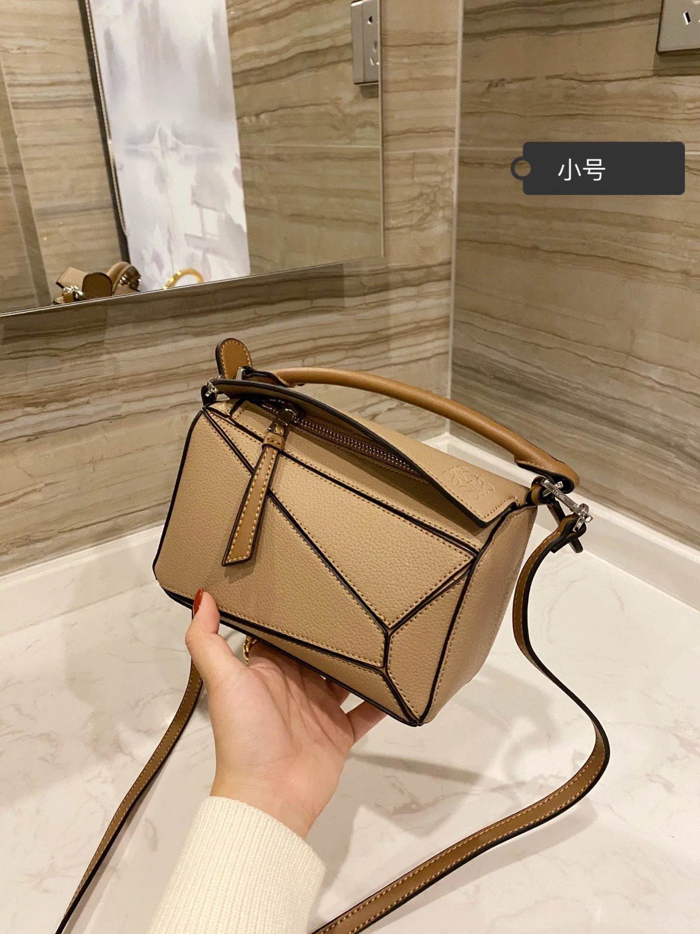 Qx sales luxury bags