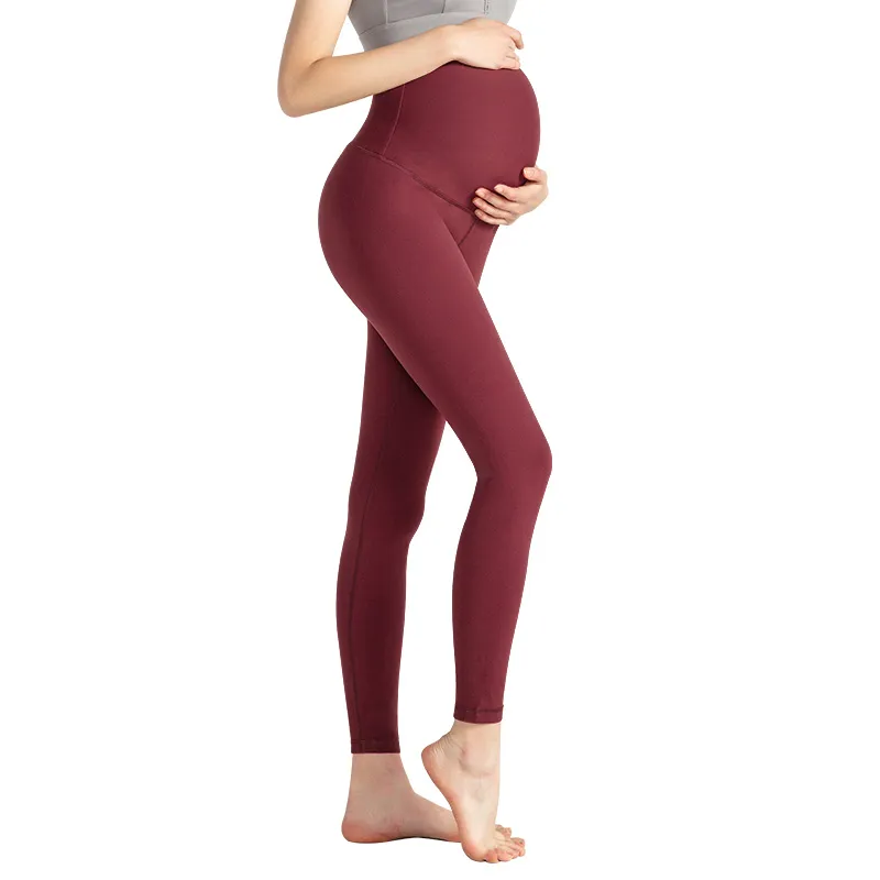 Super elastico Completo per sollevare lo stomaco Allevia lo stress Non è possibile abbassare il cavallo Materiale in nylon spandex Pantaloni cropped Pantaloni yoga premaman Vino rosso rosso Tinta unita