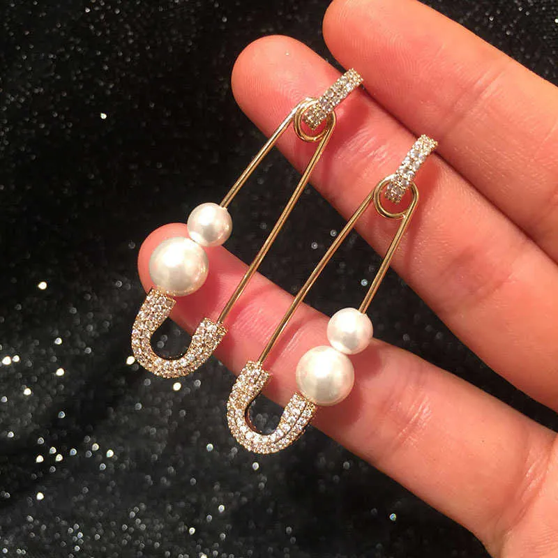 Ontworpen lente Nieuwe Dange Oorstudies Volledige diamanten Parel Pin oorbellen Creatief Design Elegant Temperament Lady Earring Luxe sieraden