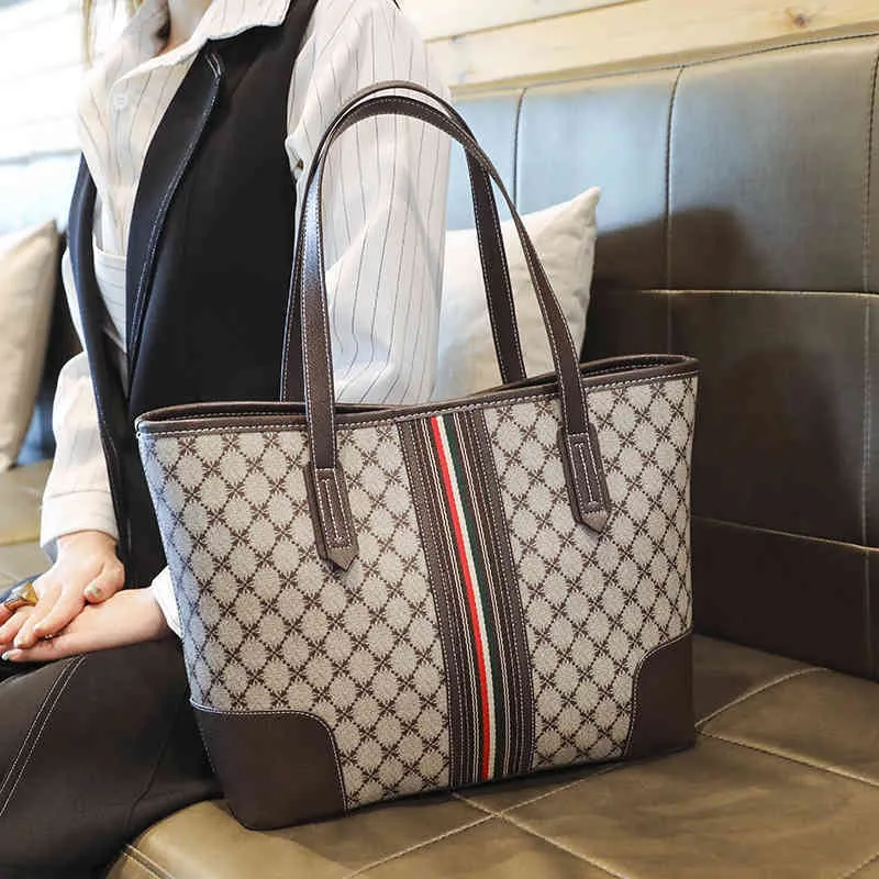 공장 판매 49% 할인 2022 스프링 새로운 한국 패션 인쇄 토트 대용량 어깨 간단한 휴대용 여성 가방 통근자 가방