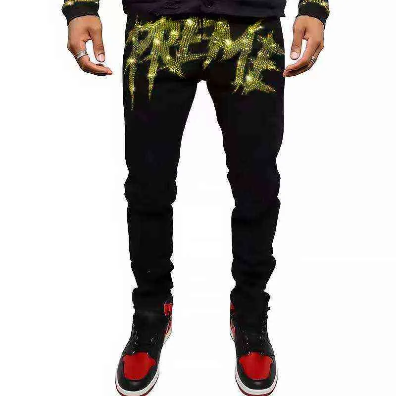 Jeans Attillati Da Uomo Strappato Pantaloni Neri Con Strass Lettere Punk Pantaloni A Matita In Denim Streetwear Da 25 44 DHgate