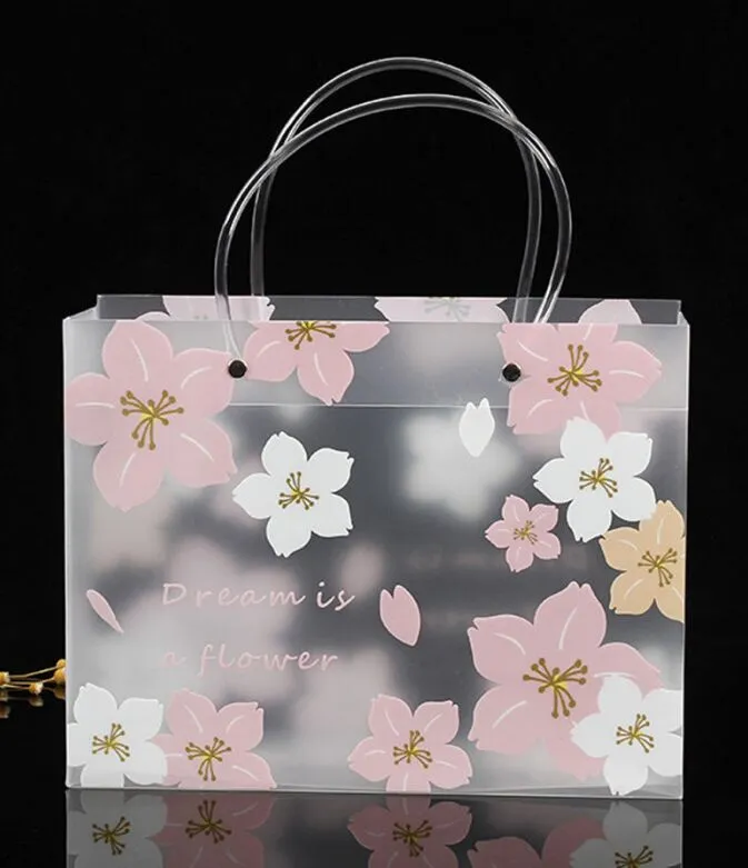 Sac étanche résistant à l'usure de fleur de cerisier Portable sacs-cadeaux transparents givrés sac à main sac à provisions emballage de vêtements
