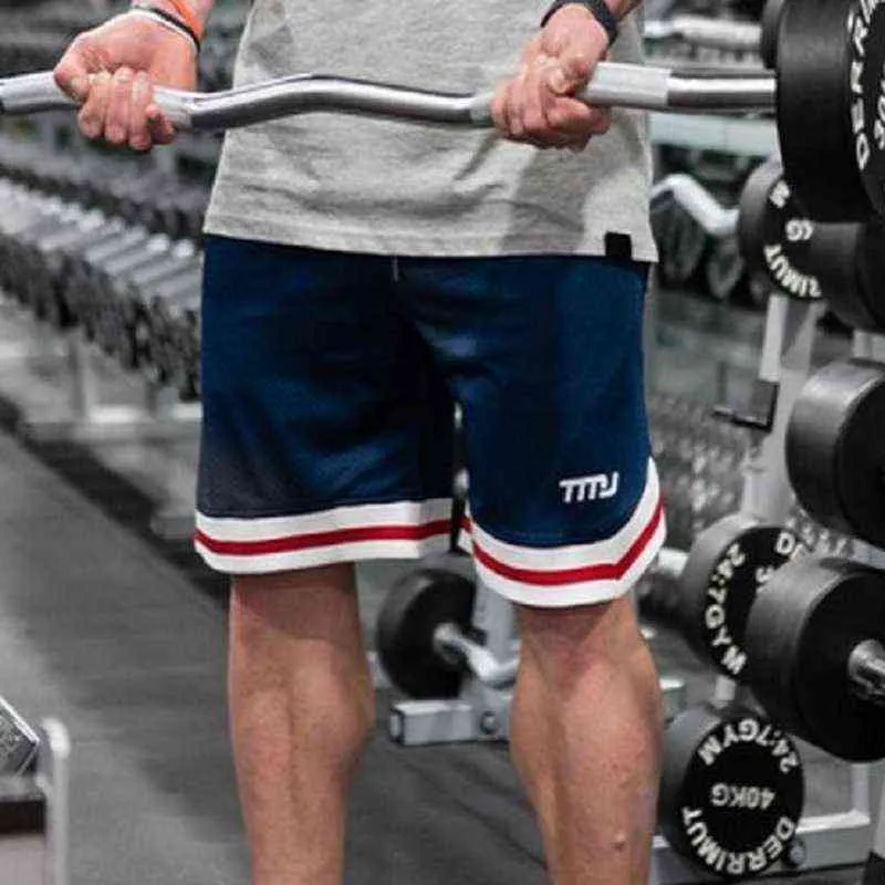 Cordon de serrage d'été sur l'entraînement de basket-ball au genou Capris lâche grand fitness sport séchage rapide SHORTS HOMMES