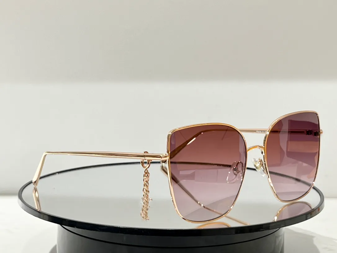 Cat-Eye-Sonnenbrille aus goldfarbenem Metall mit Anhängern, modische Damen-Sonnenbrille, UV400-Schutzbrille