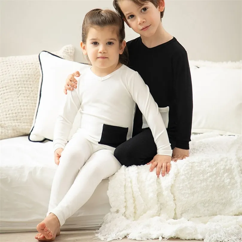 Pojkar och flickor Sommarpyjamas Ställ in mjuk elastisk ribbad hemkläder barn kläder 220507