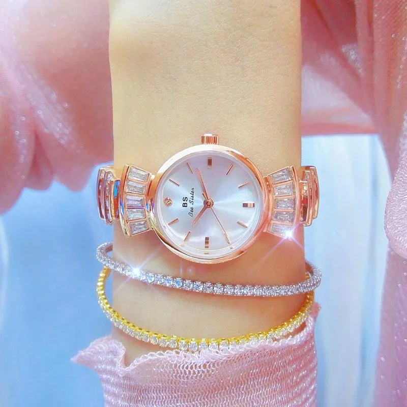 Нарученные часы Смотреть дамы кварцевые легкие роскошные ниша маленькая розовая мода Simple Diamond Watchfa1700Wristwatches