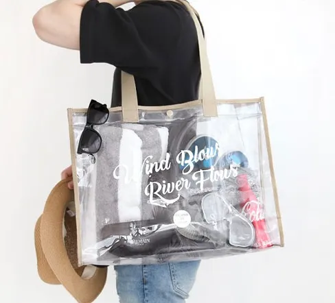 Nuevo bolso de mano transparente impermeable para mujer, bolso de playa de plástico portátil, bolso de compras de hombro de gelatina para chica de gran capacidad, moda