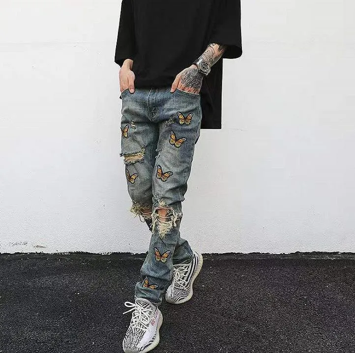 Jeans da uomo high street ricamo farfalla blu lavato jeans skinny strappati strappati strappati da uomo pantaloni hip-hop americani