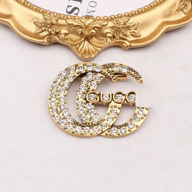 Famous brooch hotsell designers