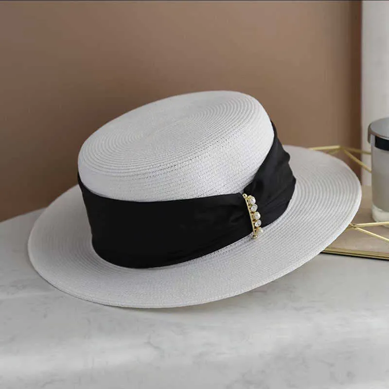 Summer Donne Casual Wide Ribbon Straw Pearls Flat Sun Protection Hat Cappello per il tempo libero all'aperto per il viaggio